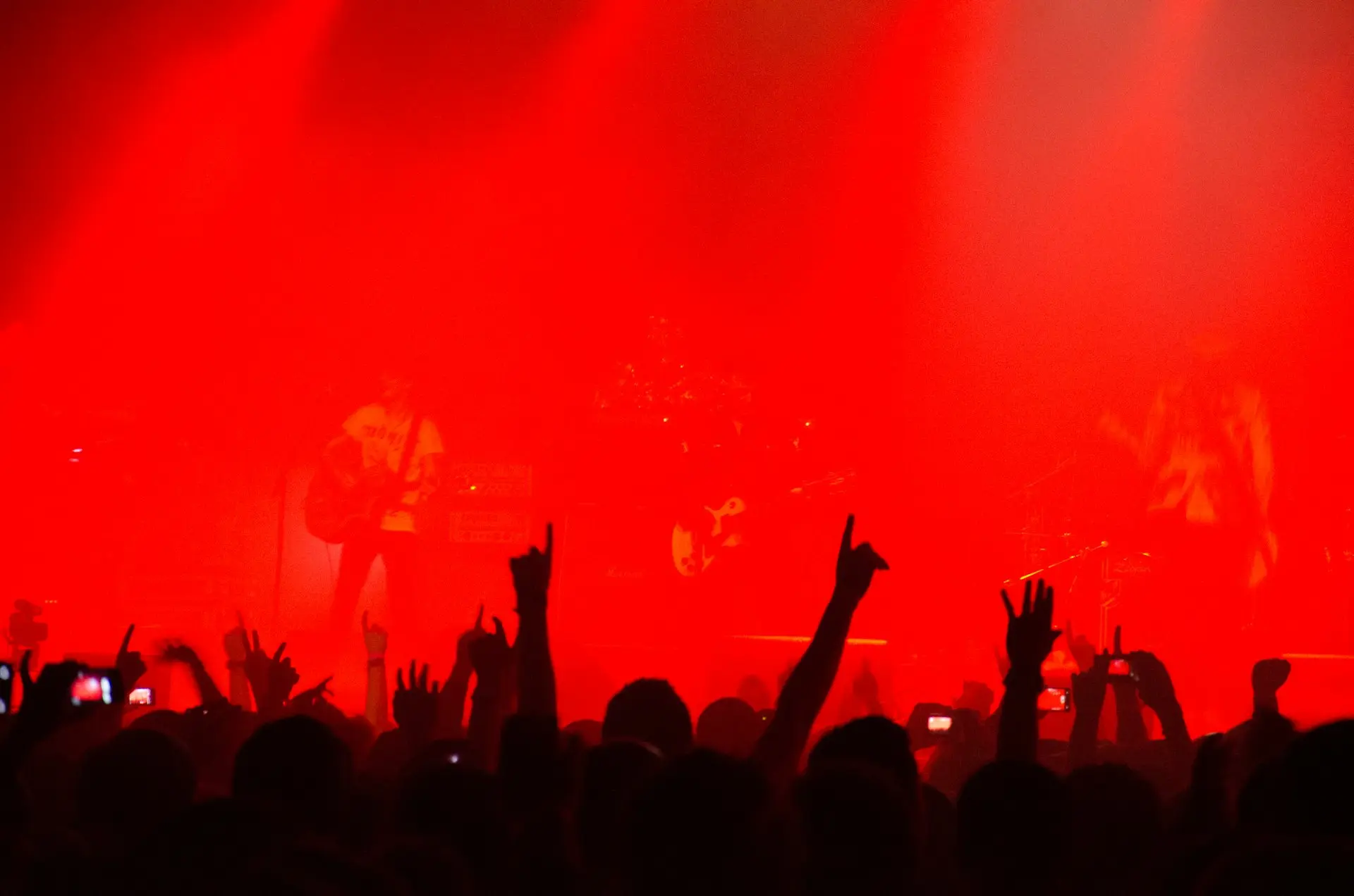 A crowd of people standing on top of a stage